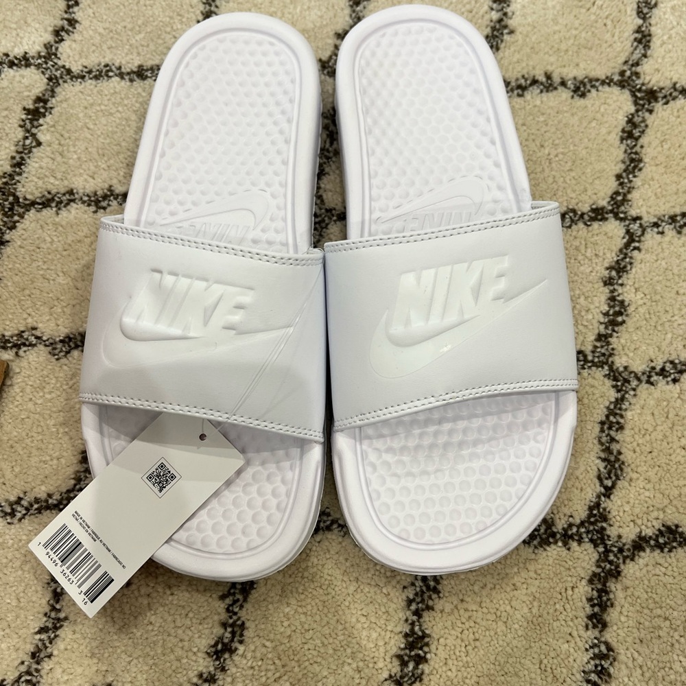 Nike White Slide Sandals with Embossed Swoosh